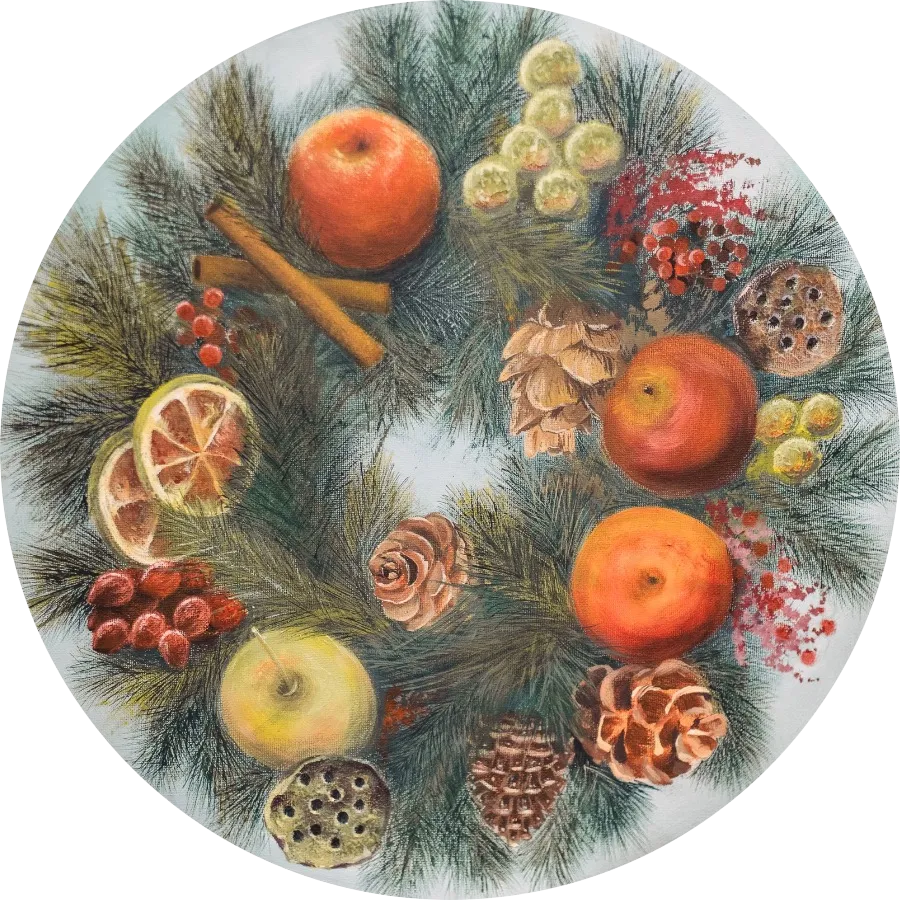 A circular composition of fruit, foliage and spices.